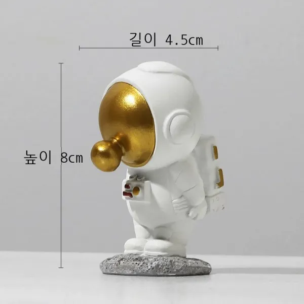 북유럽 우주인 작은 장식품, 금빛 물방울을 불다